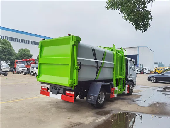 Dongfeng 4x2 6m3 side loading hanging bucket truck Picture